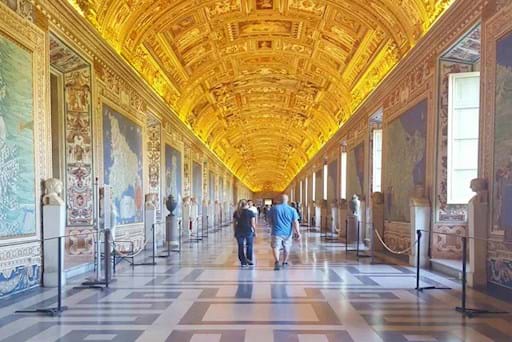 Tourists walking inside the Vatican museums