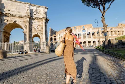 woman walking to the Colosseum